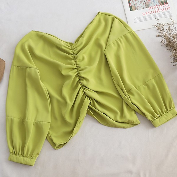 Bluză de damă elegantă cu decolteu în V în verde, roz, alb și negru