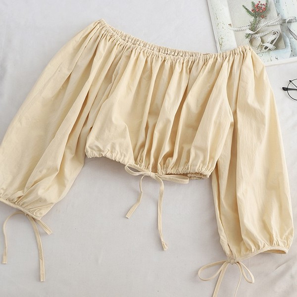 Bluză de damă modernă cu umerii goi în verde, negru și bej