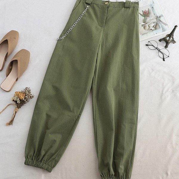 Pantaloni moderni de dama in verde, alb, negru si maro