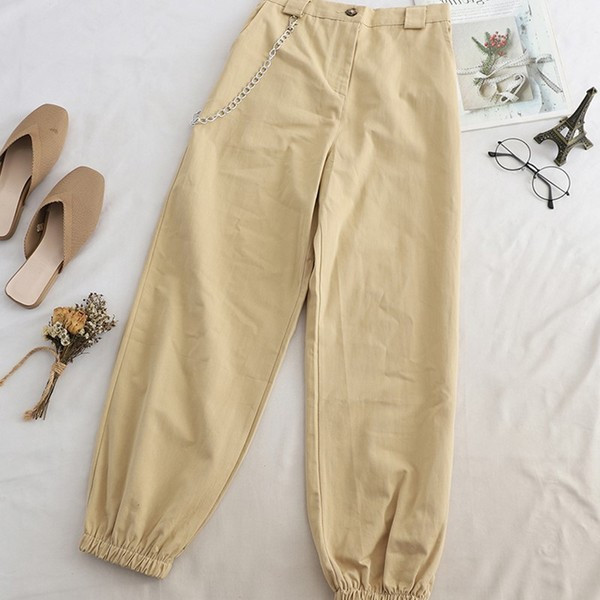 Pantaloni moderni de dama in verde, alb, negru si maro