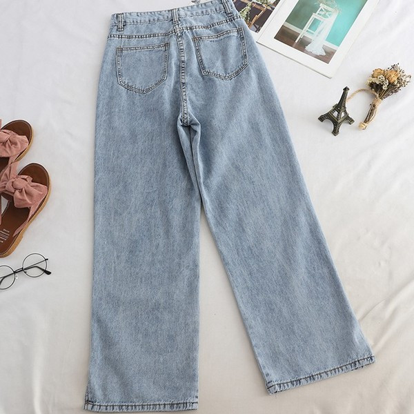 Női egyenes modell farmernadrág, kék színű hasítékkal