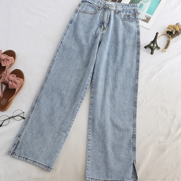 Női egyenes modell farmernadrág, kék színű hasítékkal