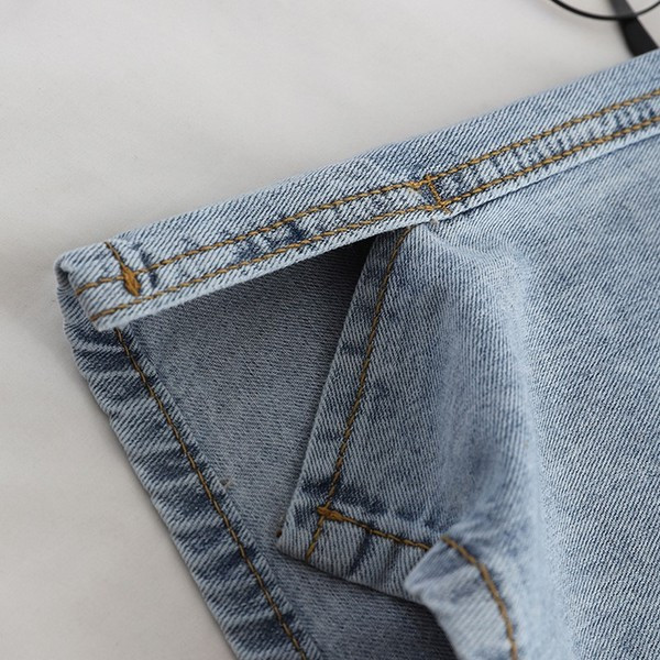 Női egyenes modell farmernadrág, kék színű hasítékkal