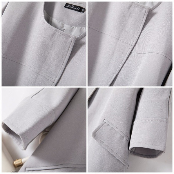 Stílusos női hosszú kabát 5XL méretig szürke színben