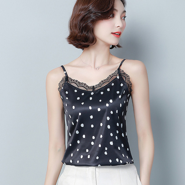 Modern női felső, vékony pántokkal, fehér és fekete színben