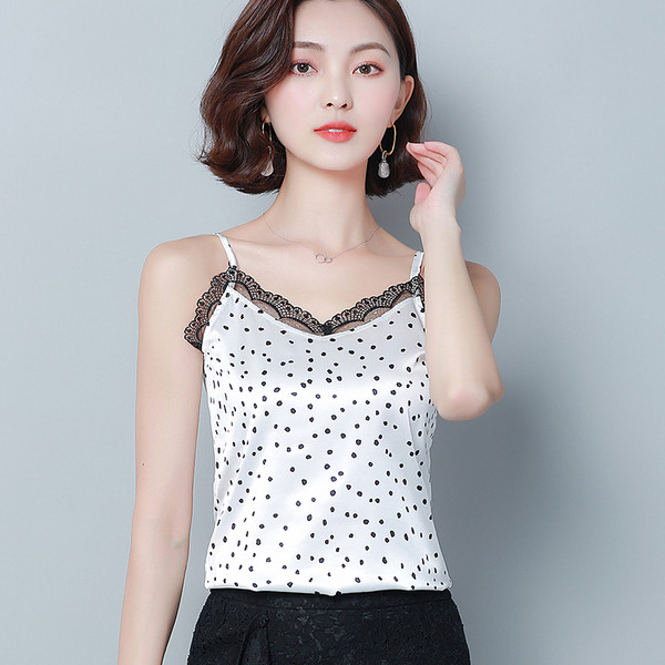 Modern női felső, vékony pántokkal, fehér és fekete színben