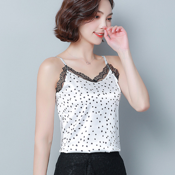 Modern női felső, vékony pántokkal, fehér és fekete színben