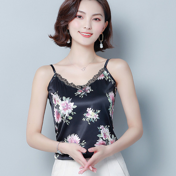 Modern női felső négy színben virágmotívumokkal