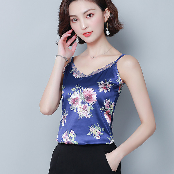 Modern női felső négy színben virágmotívumokkal