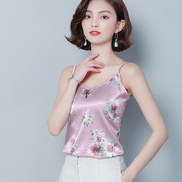 Modern női felső négy színben virágmotívumokkal