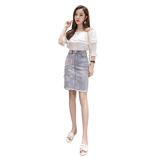 Modern női farmerszoknya díszgyöngyökkel