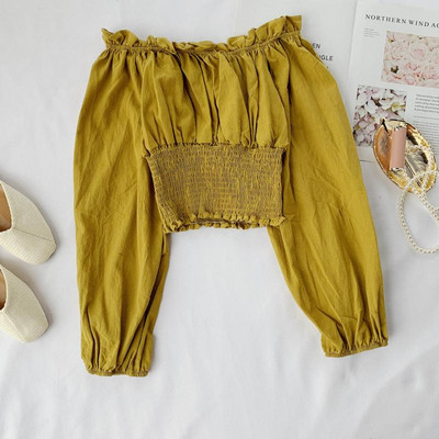 Csupasz vállú női blúz több színben