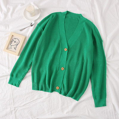 Női kardigán zöld, fekete, kék és sárga gombokkal