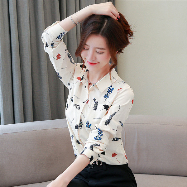 Modern női ing fehér színben, zsebbel