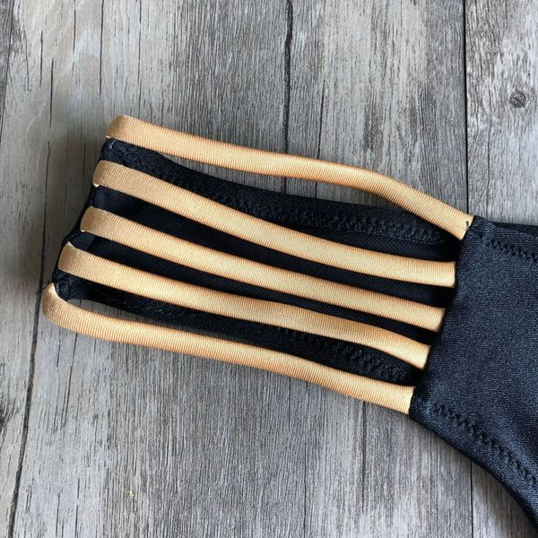 HIT modell női fürdőruha két részes fekete és arany színben