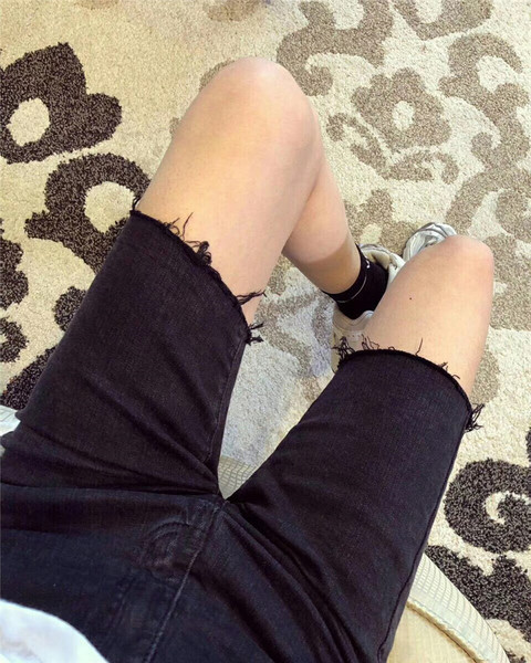 Jelenlegi női nadrág 3/4 hosszúságban, sötét színben