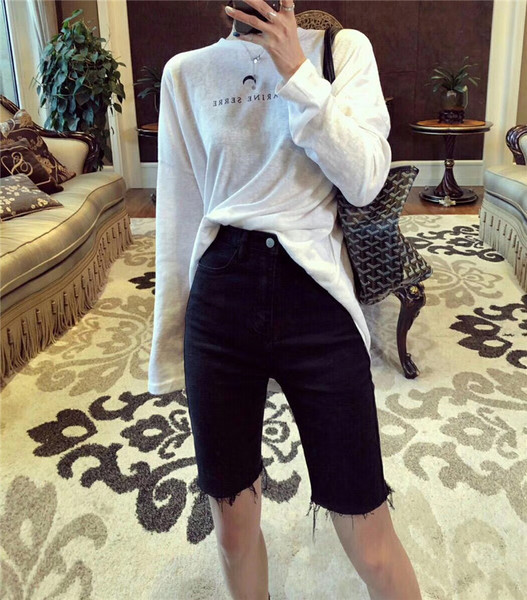 Jelenlegi női nadrág 3/4 hosszúságban, sötét színben