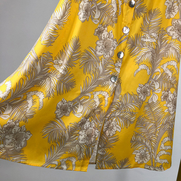 Női hosszú szoknya gombokkal és gumírozott derékkal