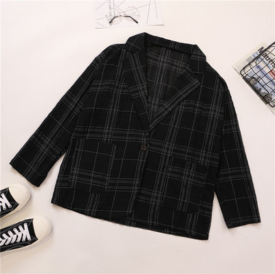 Női kockás kabát fekete-fehér színben