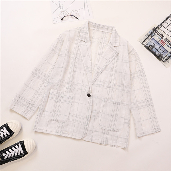 Női kockás kabát fekete-fehér színben