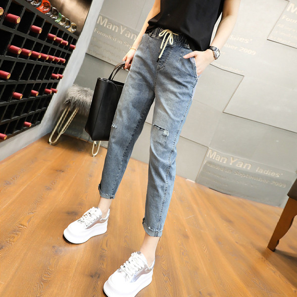 Alkalmi női farmer normál derékkal