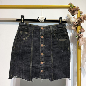 Női farmer rövid szoknya kék és fekete gombokkal