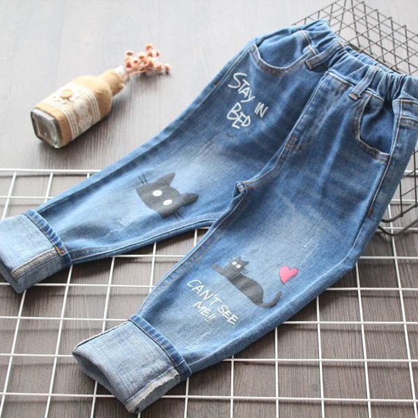 Modern, kék színű, rátéttel ellátott gyerekfarmer lányoknak