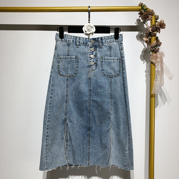 Hosszú farmerszoknya kék gombokkal és zsebekkel