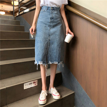 Modern női farmerszoknya magas derékkal, szakadt motívumokkal