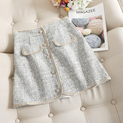 Stílusos női szoknya magas derékkal, világos színekben