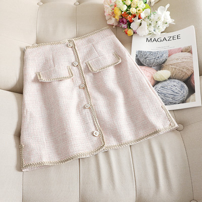 Stílusos női szoknya magas derékkal, világos színekben