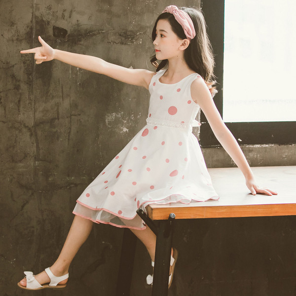 Új modell szabású, pöttyös gyerekruha két színben