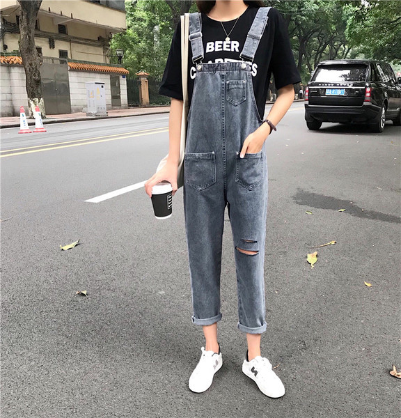 Női farmer overall szakadt motívumokkal, kék színben