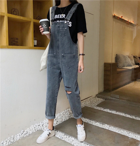 Női farmer overall szakadt motívumokkal, kék színben