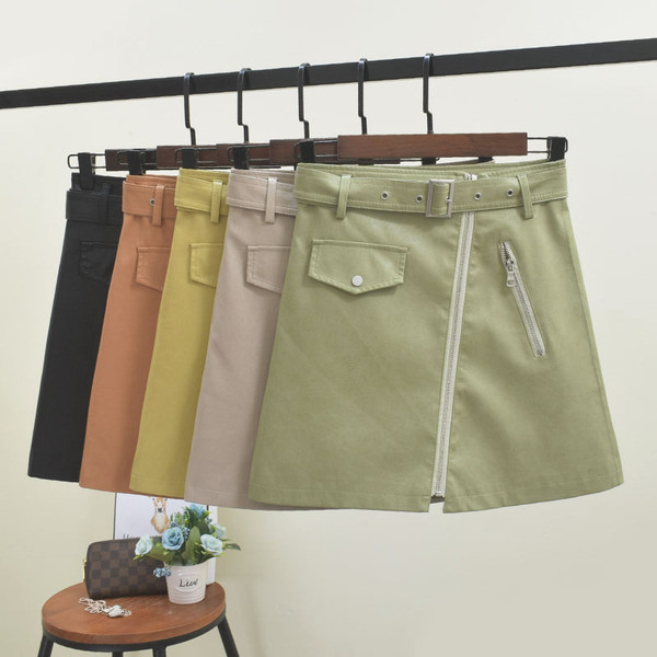 Női szoknya cipzárral és övvel több színben