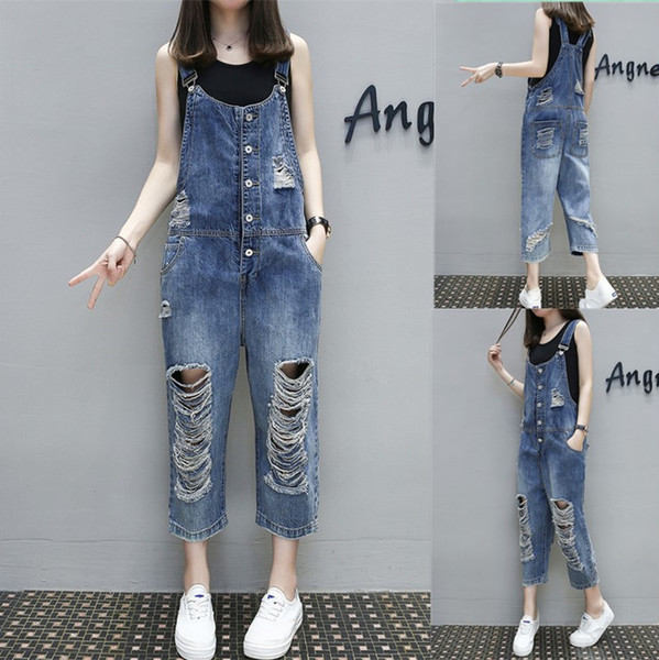 Lezser női farmer overál szakadt motívumokkal