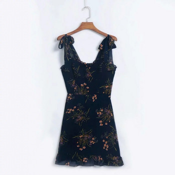 Stílusos női ruha fekete pántokkal