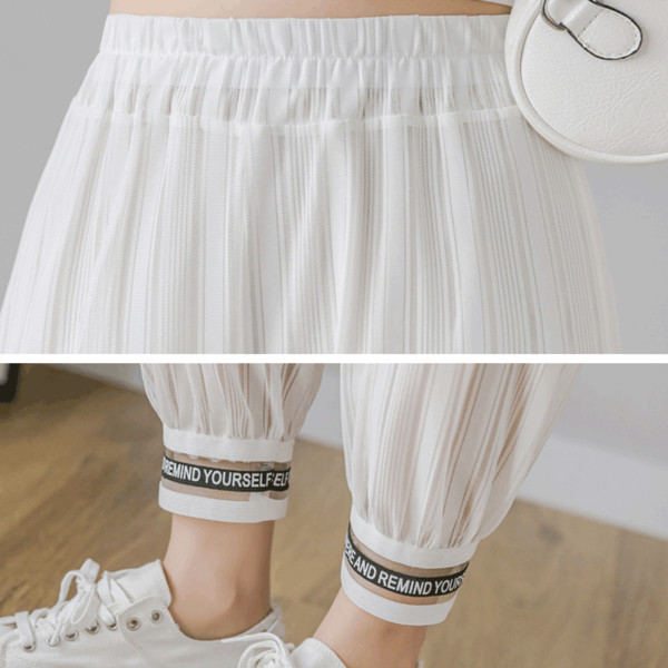 Modern női nadrág rugalmas derékkal, két színben