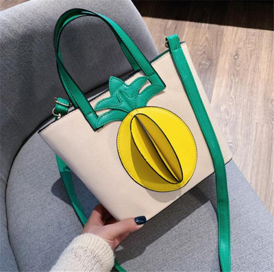 Modern női táska ananászos sárga és zöld színben