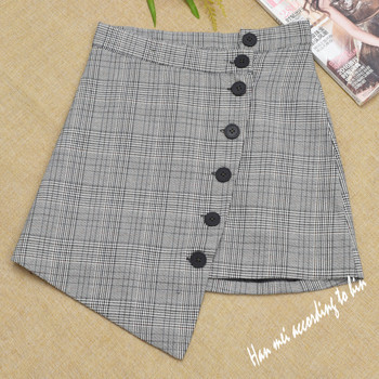 Női szoknya aszimmetrikus modell több színben gombokkal