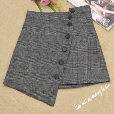 Női szoknya aszimmetrikus modell több színben gombokkal