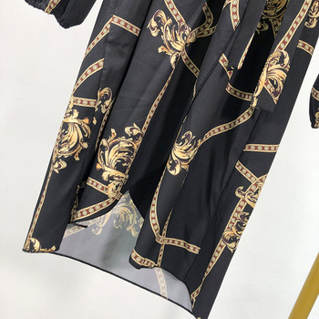 Hosszú fekete ruha mély V-nyakkal, mintával