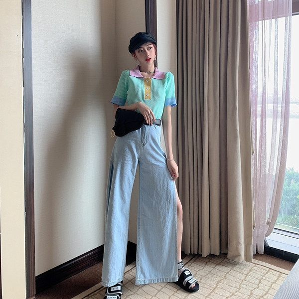 Modern női szabású, hasított farmernadrág