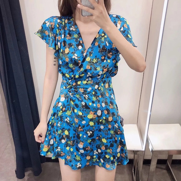 Női alkalmi ruha, kék virágos motívumokkal