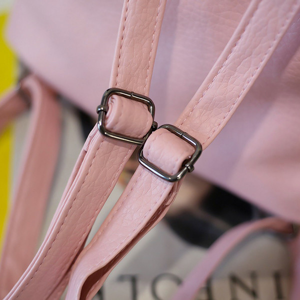 Hétköznapi női hátizsák fém elemekkel több színben