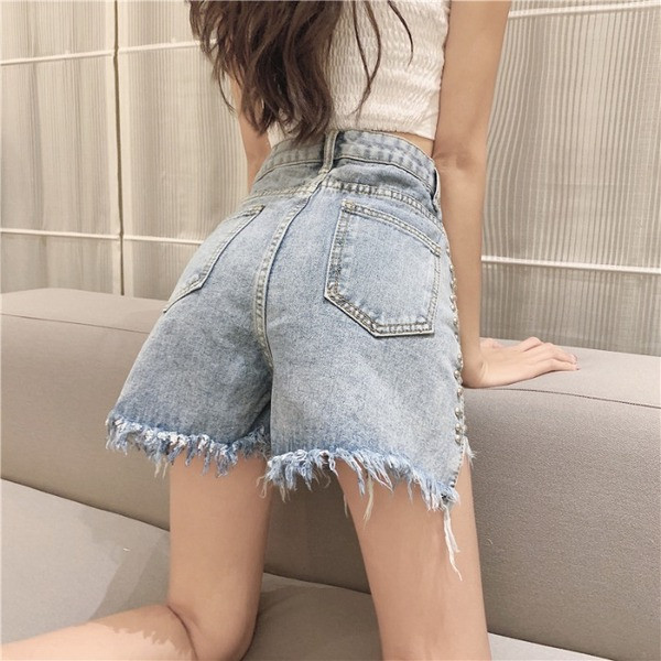 Alkalmi női rövidnadrág fűzővel