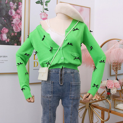 Vestă modernă de damă în alb, negru și verde