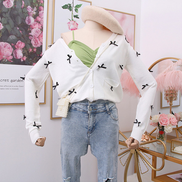 Vestă modernă de damă în alb, negru și verde