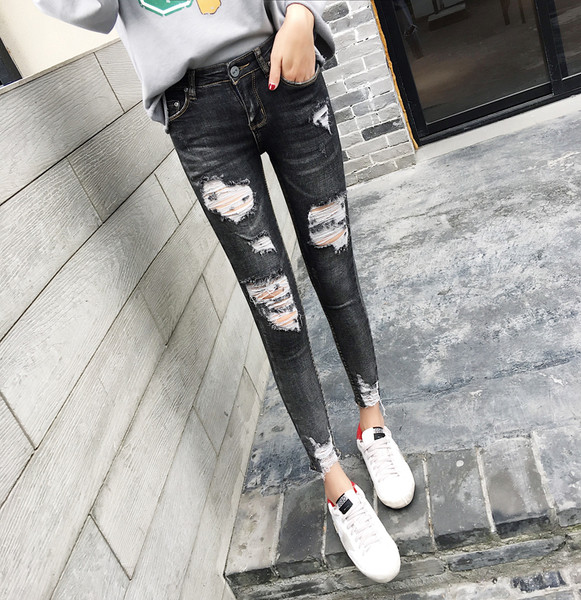 Blugi casual de dama de culoare inchisa cu motive rupte