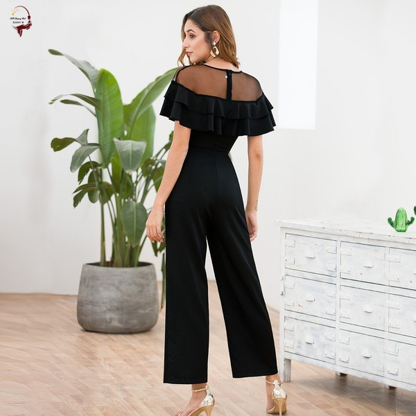 Salopetă de damă modernă, cu decolteu adânc și mâneci scurte, de culoare neagră